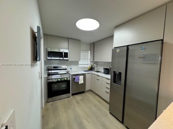 8900 Washington Blvd # 304A, Pembroke Pines FL 33025 — #A11868910