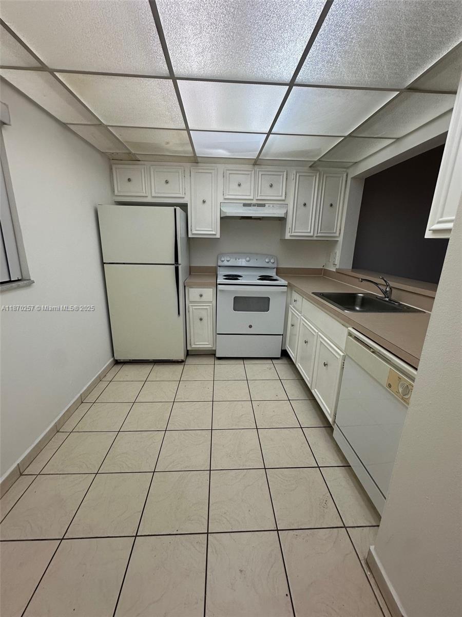 83dcefb7-7952 17911 NW 68th Ave # N206, Hialeah FL 33015 — #A11870257