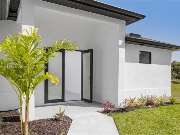 821 Newell St E, Lehigh Acres FL 33974 — #A11871339