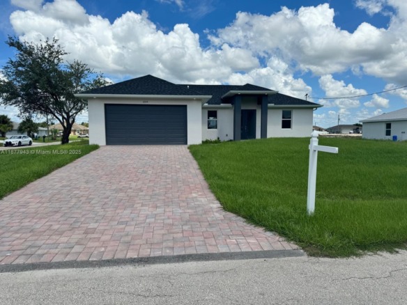 2044 Crawford Ave N, Lehigh Acres FL 33971 — #A11877943