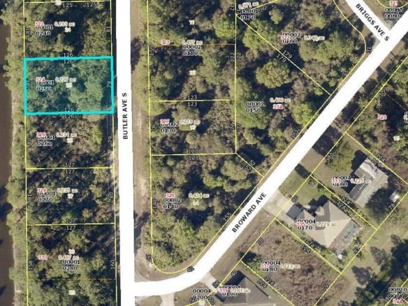 324 Butler Avenue S, Lehigh Acres FL 33974 — #R10832841