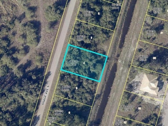 545 Osage Avenue S, Lehigh Acres FL 33974 — #R10900548