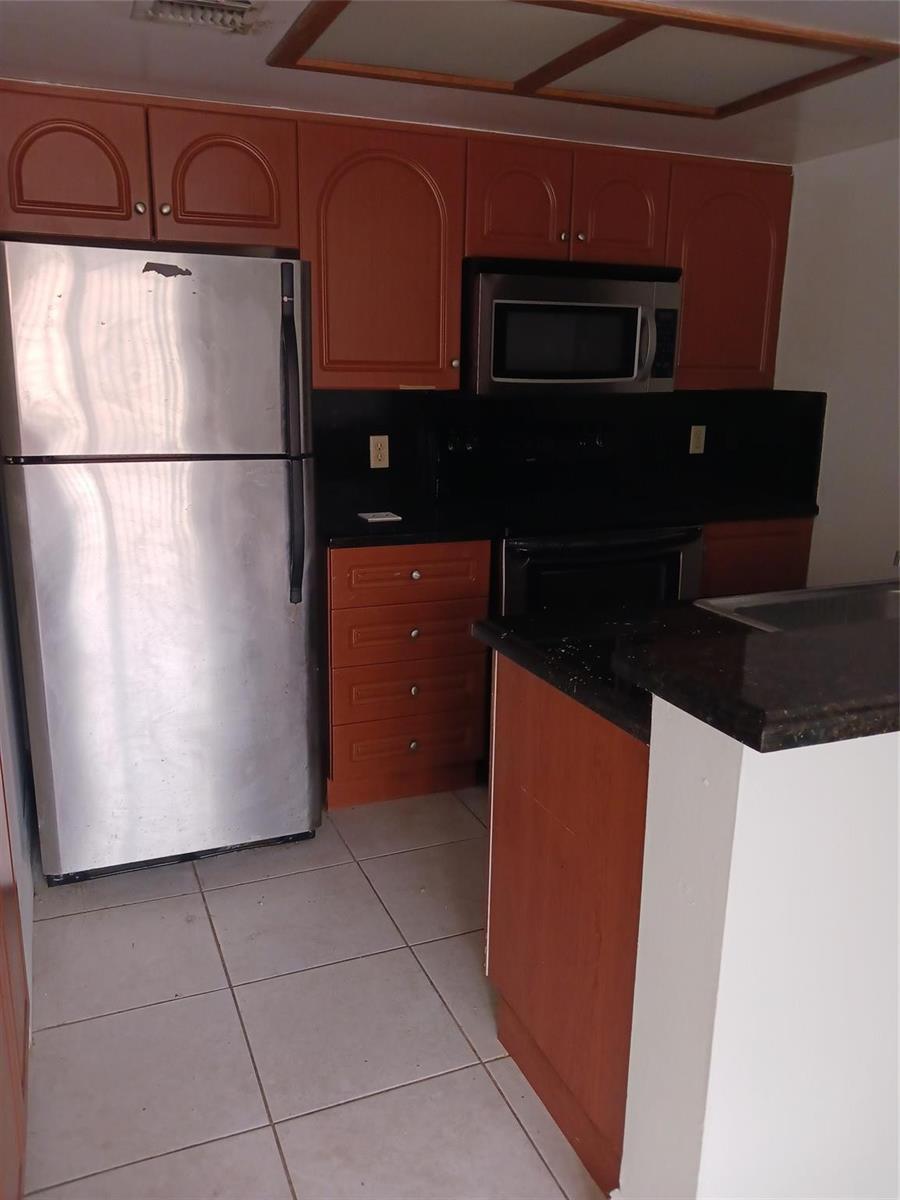 CREATOR: gd-jpeg v1.0 (using IJG JPEG v62), quality = 90 8307 Coral Lake Manor # 8307, Coral Springs FL 33065 — #F10427588