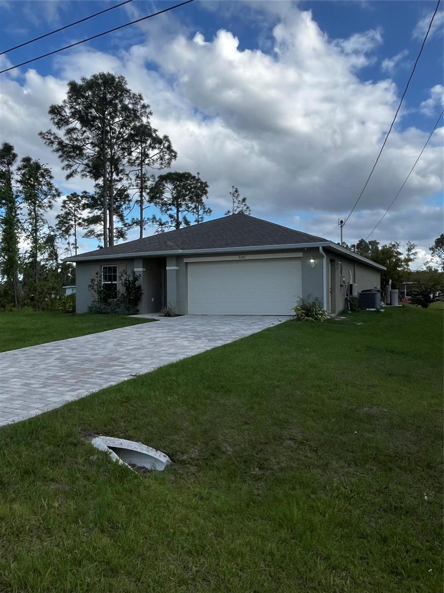 CREATOR: gd-jpeg v1.0 (using IJG JPEG v62), quality = 90 3201 W 23rd Street, Lehigh Acres FL 33971 — #F10430804