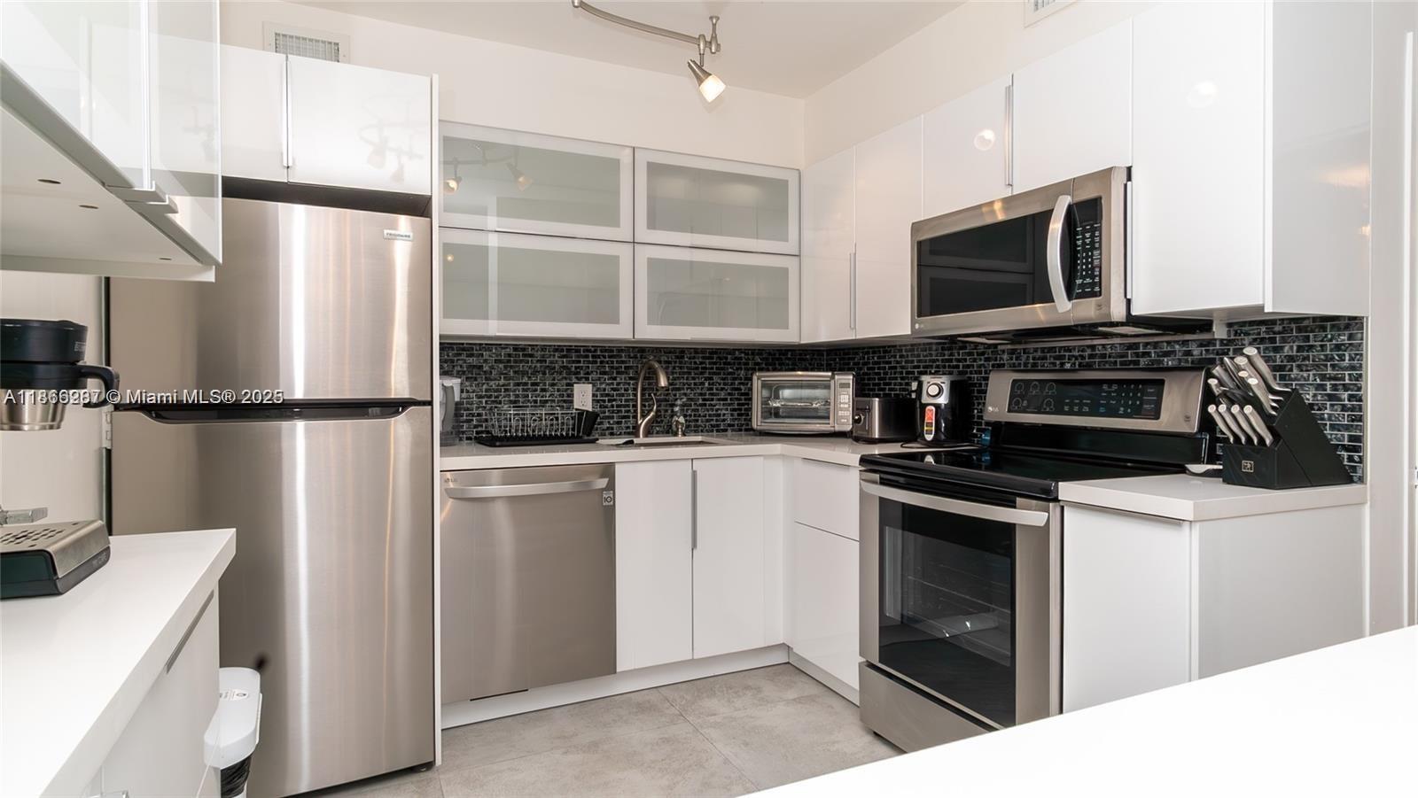 5161 Collins Ave # 811, Miami Beach FL 33140 — #A11866287