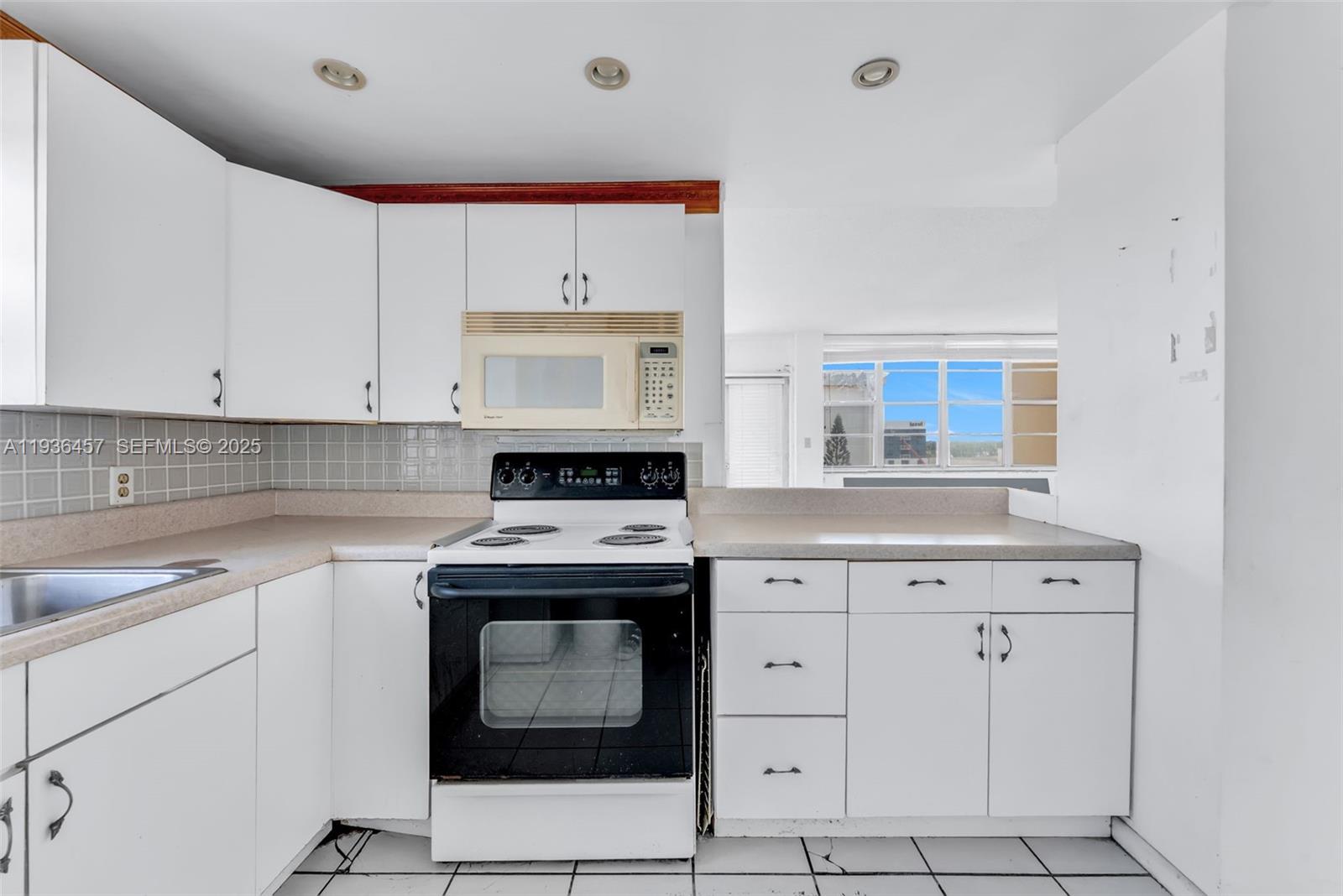 84b12bae-1707 2025 NE 164th St # 809, North Miami Beach FL 33162 — #A11936457