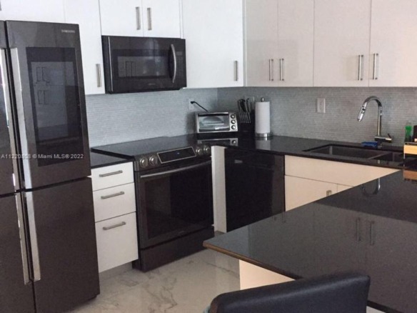 2301 Collins Ave # 1503, Miami Beach FL 33139 — #A11220808
