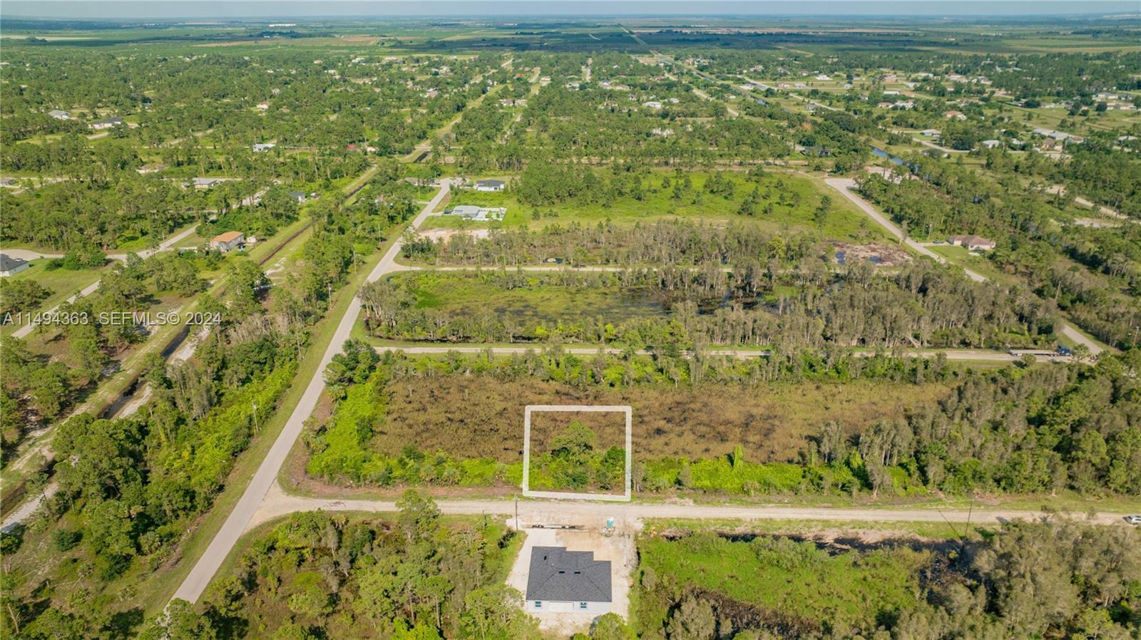 853 Belden Ave, Lehigh Acres FL 33936 — #A11494363