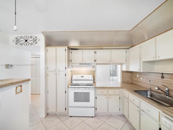 6090 N Sabal Palm Blvd # 204, Tamarac FL 33319 — #A11666164
