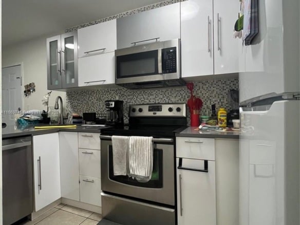 8075 NW 7th St # 109, Miami FL 33126 — #A11669745