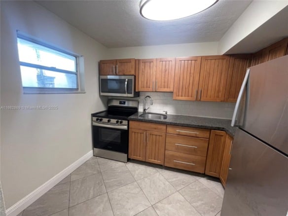 4255 N University Dr # 201, Sunrise FL 33351 — #A11682869