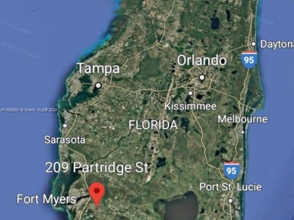 209 Partridge St, Lehigh Acres FL 33974 — #A11692584
