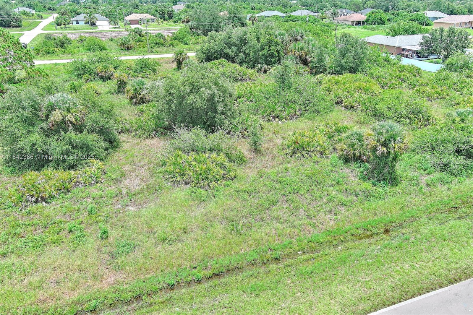 841 Milwaukee Blvd, Lehigh Acres FL 33974 — #A11842386