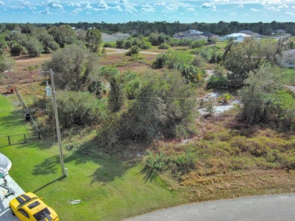 309 Raber Ave, Lehigh Acres FL 33974 — #A11713666