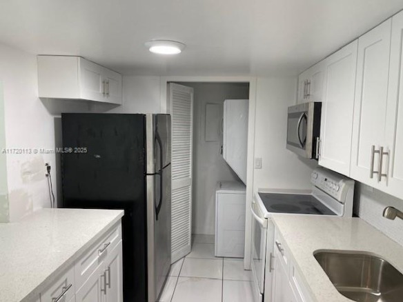 301 Racquet Club Rd # 201, Weston FL 33326 — #A11720113