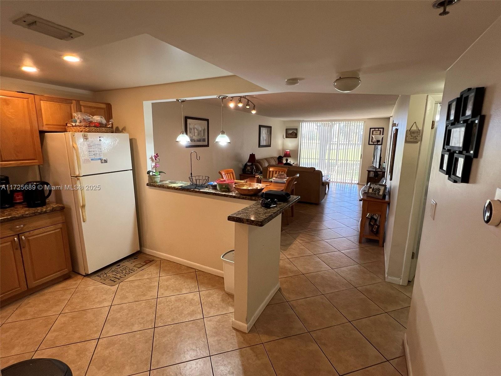 84b12bae-3743 3300 W Rolling Hills Cir # 102, Davie FL 33328 — #A11725689