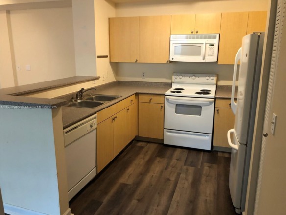 1919 Van Buren St # 104A, Hollywood FL 33020 — #A11732402
