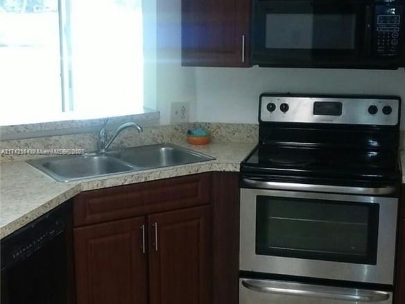 3441 NW 44th St # 106, Oakland Park FL 33309 — #A11742354