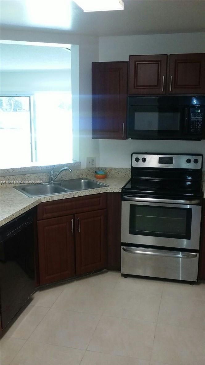 3441 NW 44th St # 106, Oakland Park FL 33309 — #A11742354