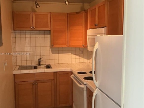 200 S Birch Rd # 404, Fort Lauderdale FL 33316 — #A11749844