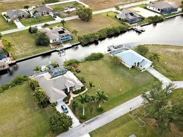 407 NW 33rd Ave, Cape Coral FL 33993 — #A11752775