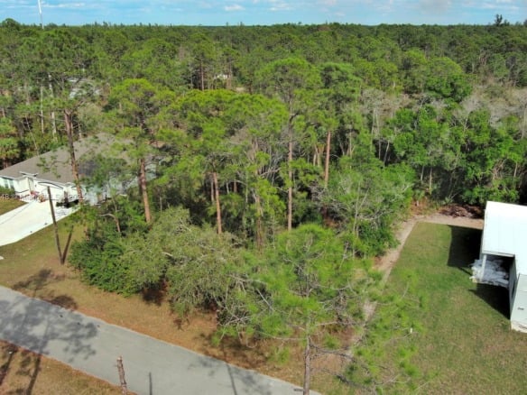 1702 Greenwood Ave, Lehigh Acres FL 33972 — #A11755748