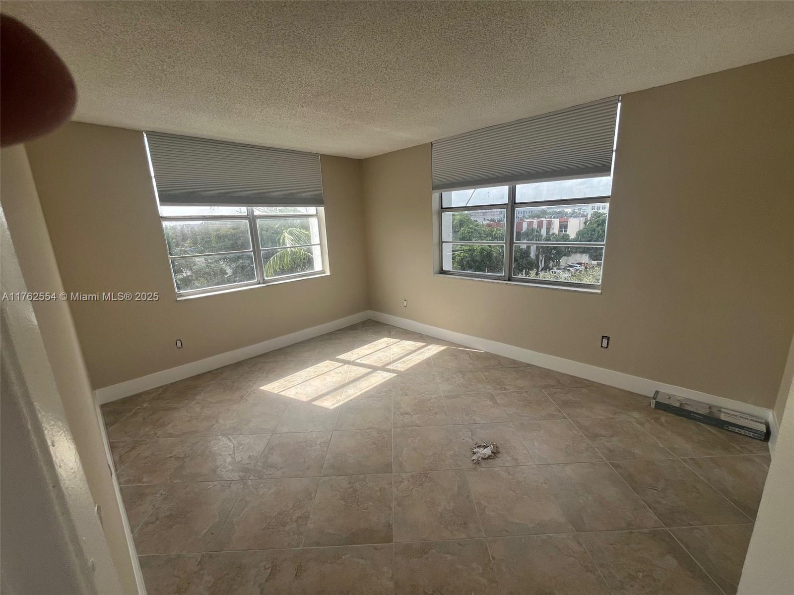 498 NW 165th St # 501, Miami FL 33169 — #A11762554