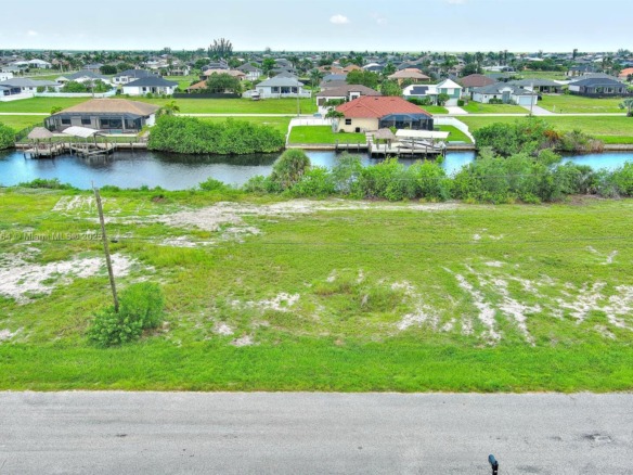 1228 NW 34th Ave, Cape Coral FL 33993 — #A11851264