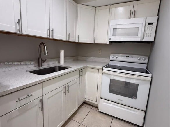 4705 NW 7th St # 7, Miami FL 33126 — #A11808927