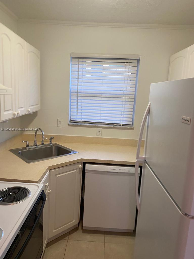 84b12bae-5064 1975 NE 135th St # 2D, North Miami FL 33181 — #A11809793