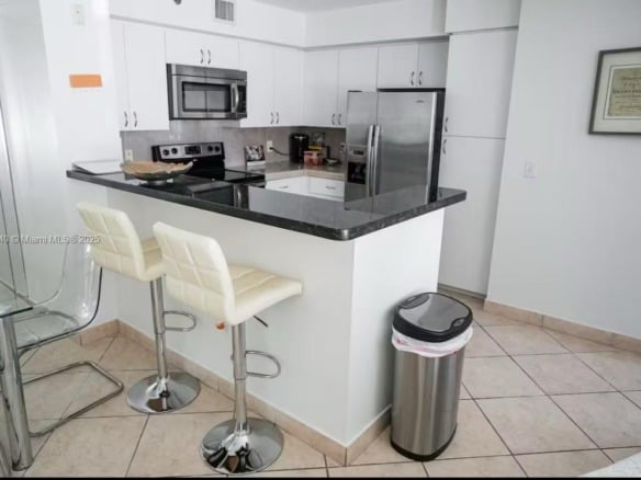 19601 E Country Club Drive # 203, Aventura FL 33180 — #A11815540