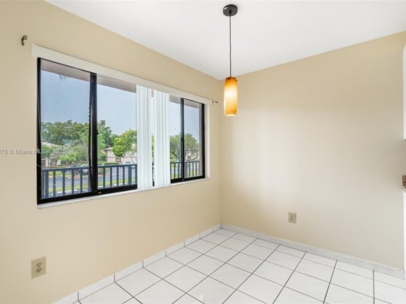 9455 N Belfort Cir # 211, Tamarac FL 33321 — #A11823075