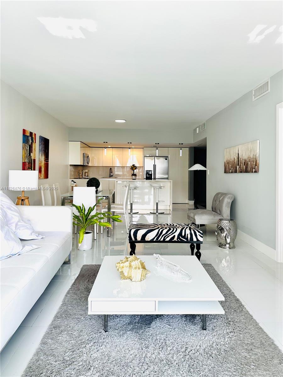 19390 Collins Ave # 911, Sunny Isles Beach FL 33160 — #A11826476