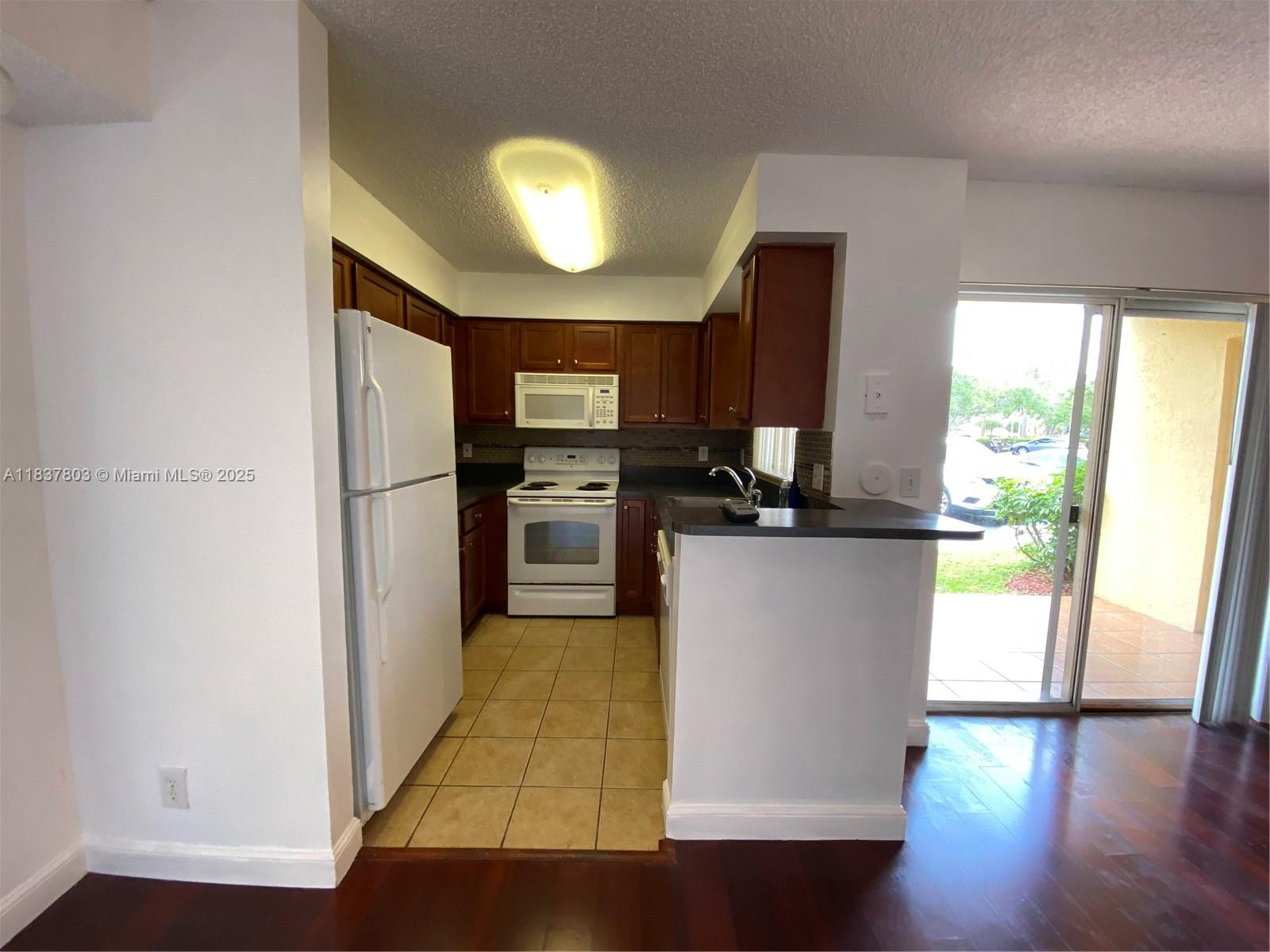 84b12bae-5756 7640 Westwood Dr # 406, Tamarac FL 33321 — #A11837803