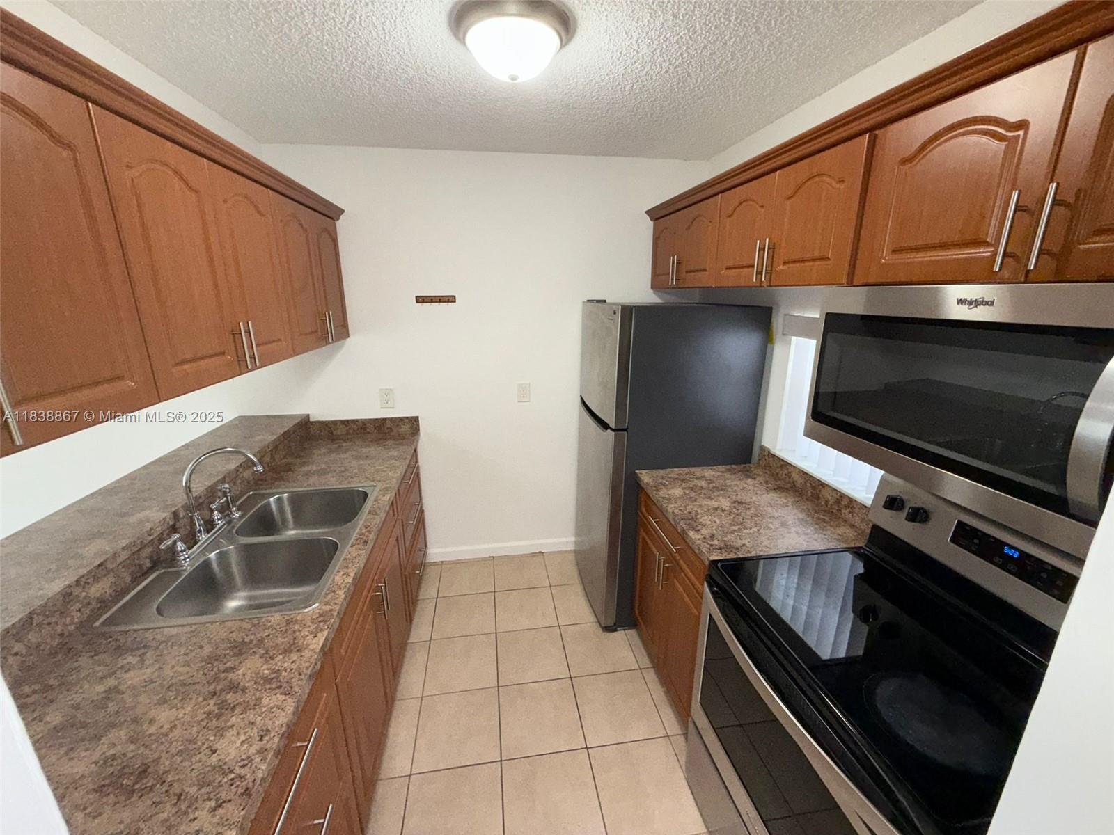 84b12bae-5785 8560 N Sherman Cir # 105, Miramar FL 33025 — #A11838867