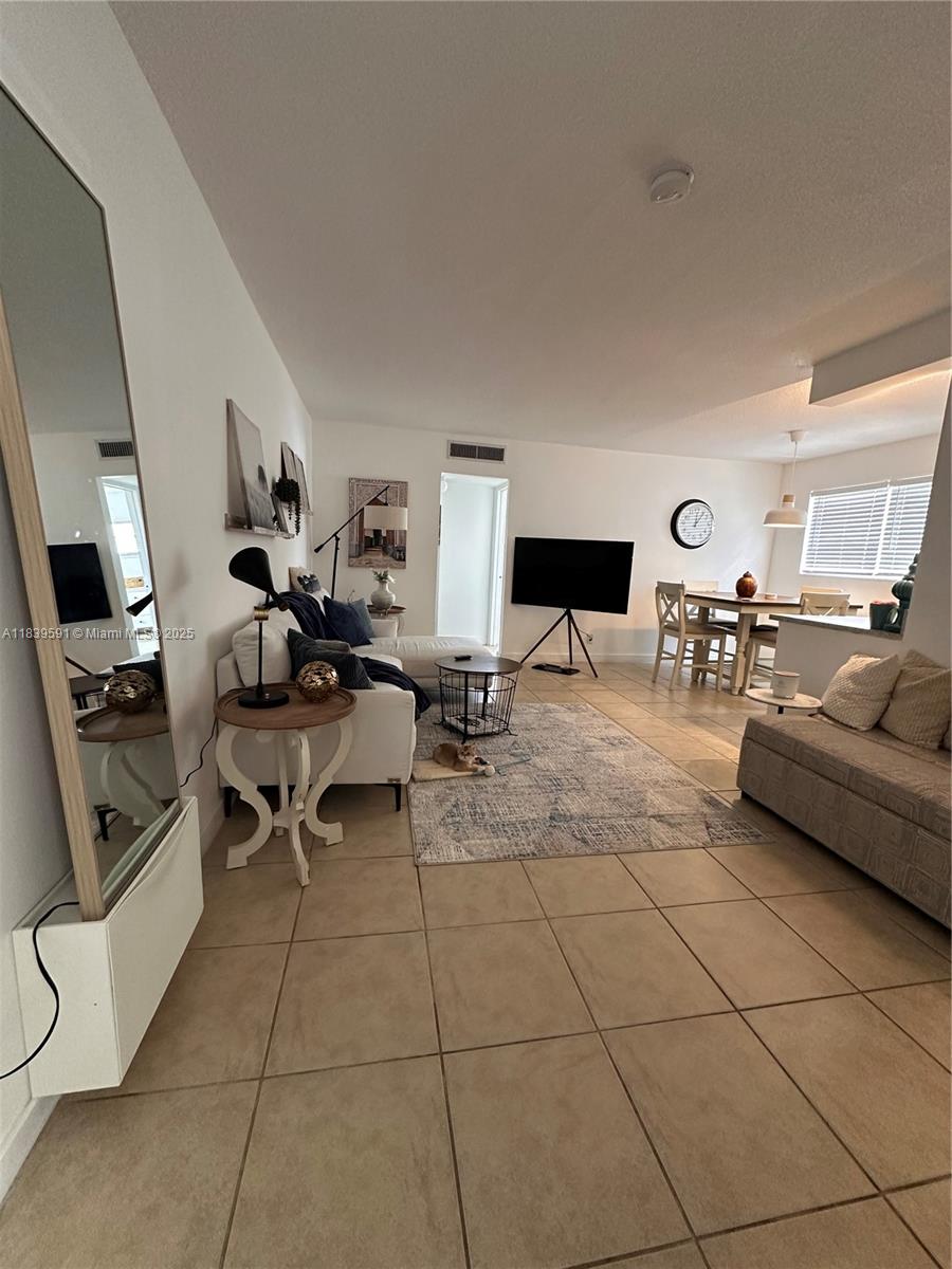 84b12bae-5802 1100 NE 1st Ct # 103, Hallandale Beach FL 33009 — #A11839591