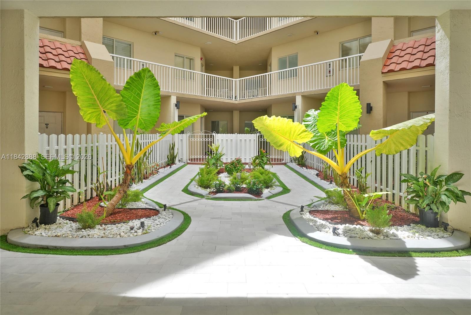 84b12bae-5918 10720 NW 66th St # 205, Doral FL 33178 — #A11842888