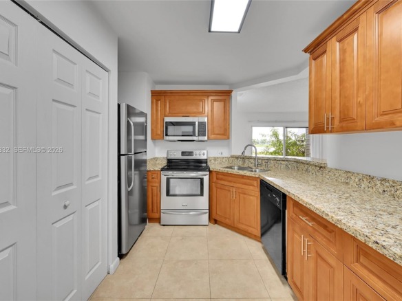 3453 NW 44th St # 107, Oakland Park FL 33309 — #A11846332
