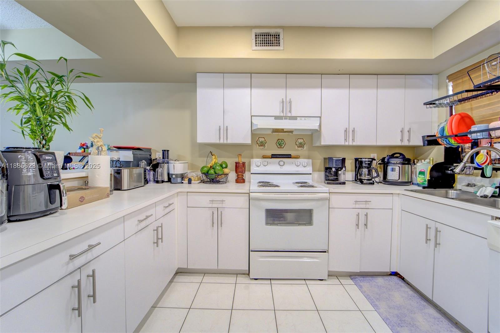 84b12bae-609 14915 SW 80th St # 205, Miami FL 33193 — #A11885623