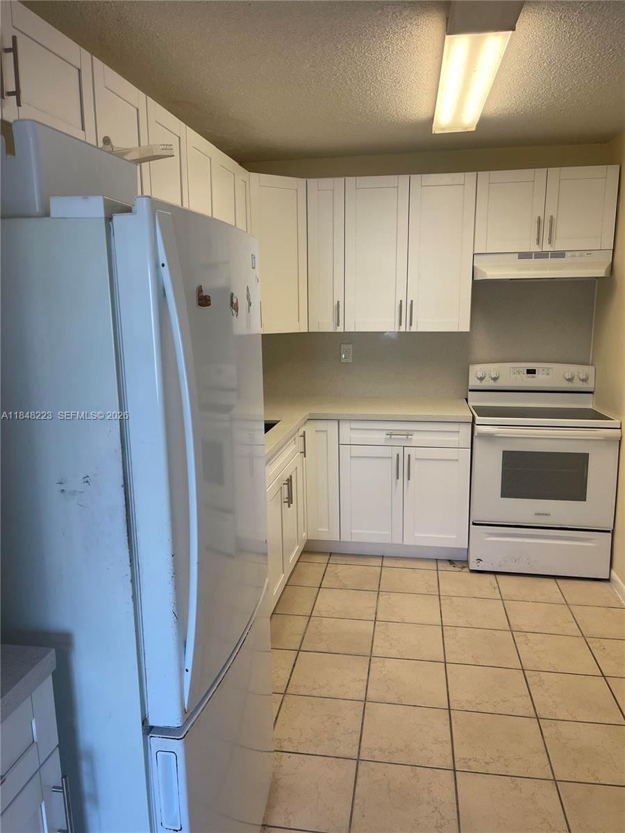1325 W 68th St # 221, Hialeah FL 33014 — #A11848223