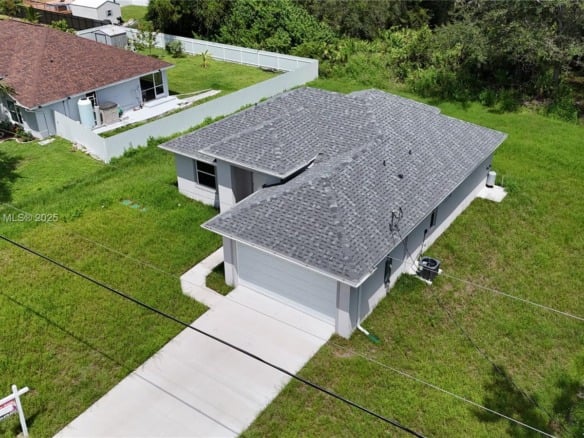 739 Sunrise Blvd, Lehigh Acres FL 33974 — #A11852668