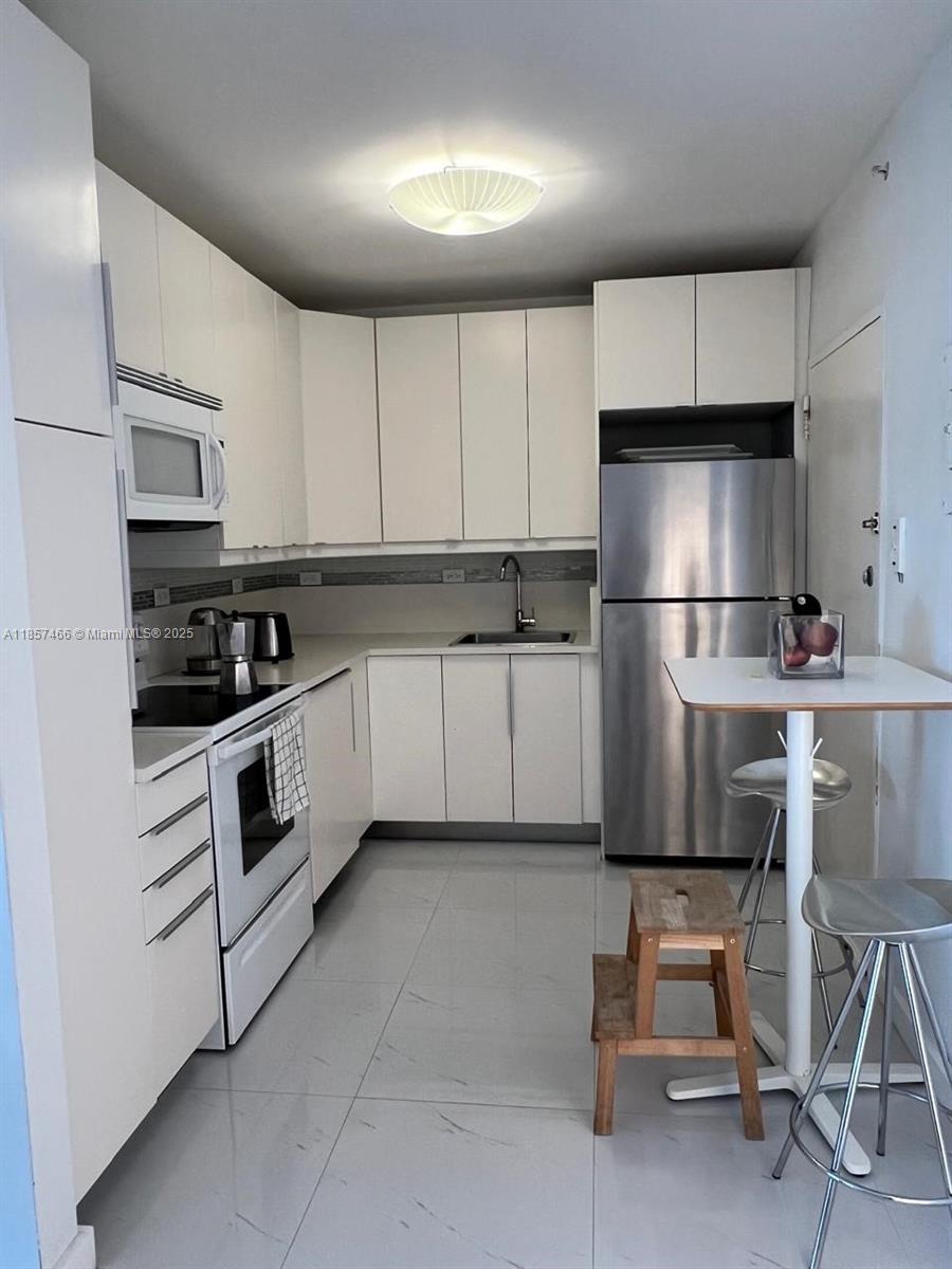 5601 Collins Ave # 1115, Miami Beach FL 33140 — #A11857466