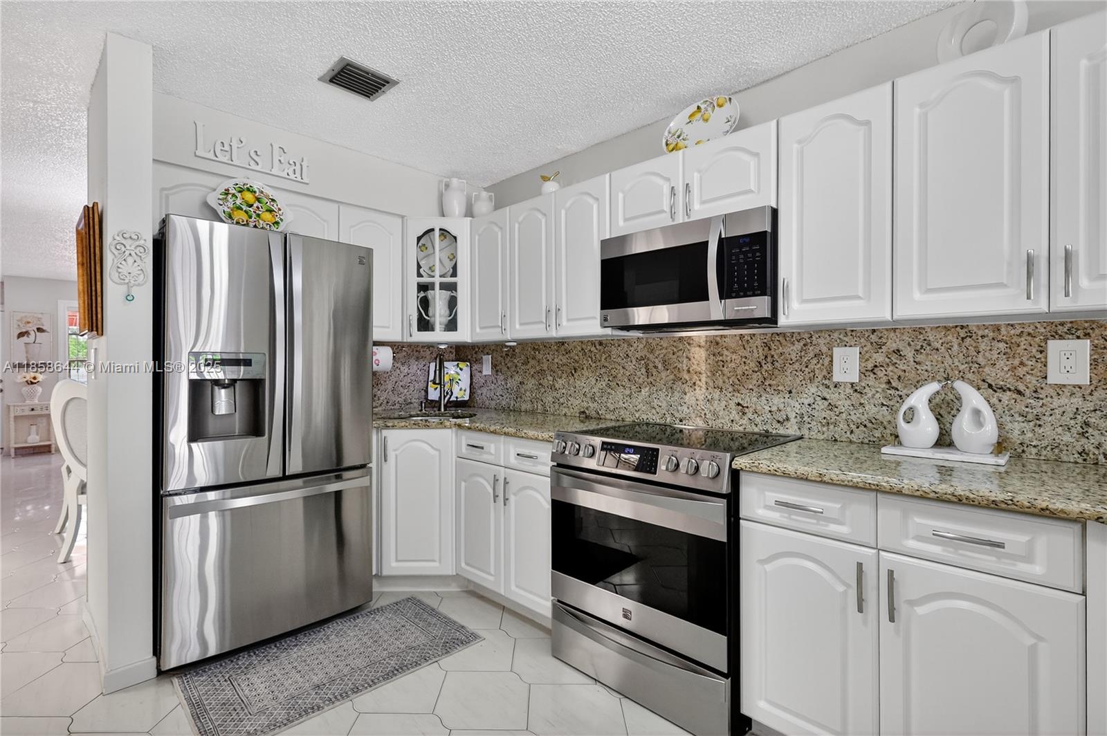 6570 W 2nd Ct # 19C, Hialeah FL 33012 — #A11858644