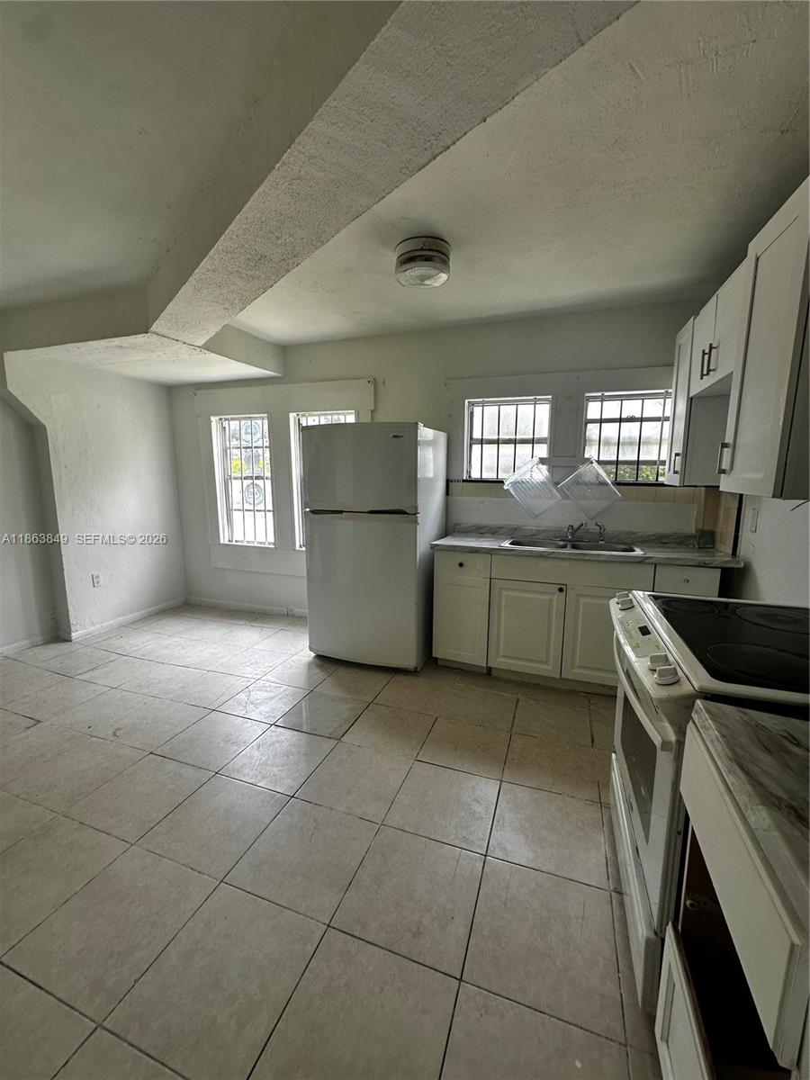 84b12bae-6728 1925 NW 56th St, Miami FL 33142 — #A11863849