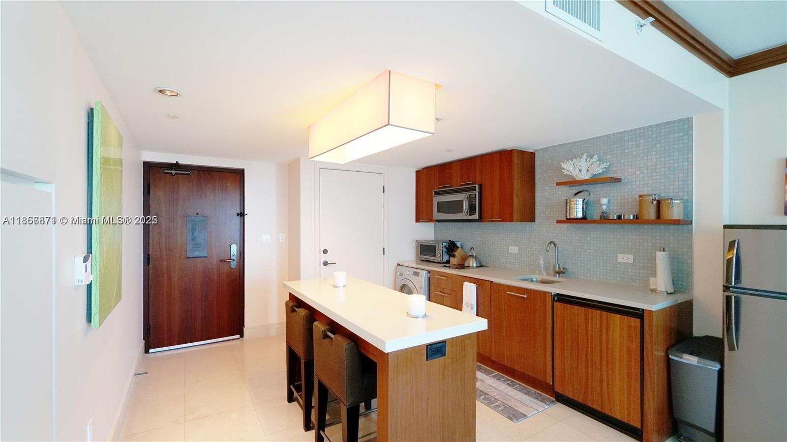84b12bae-6874 6801 Collins Ave # 710, Miami Beach FL 33141 — #A11866871