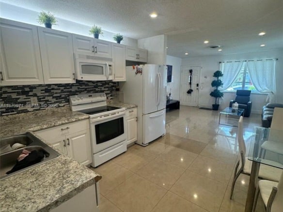4808 NW 27th Ter, Tamarac FL 33309 — #A11870974