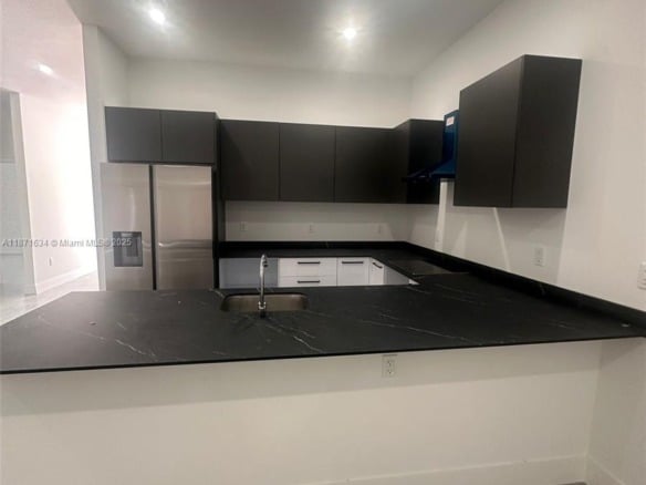 2423 NW 23rd Ln, Fort Lauderdale FL 33311 — #A11871634