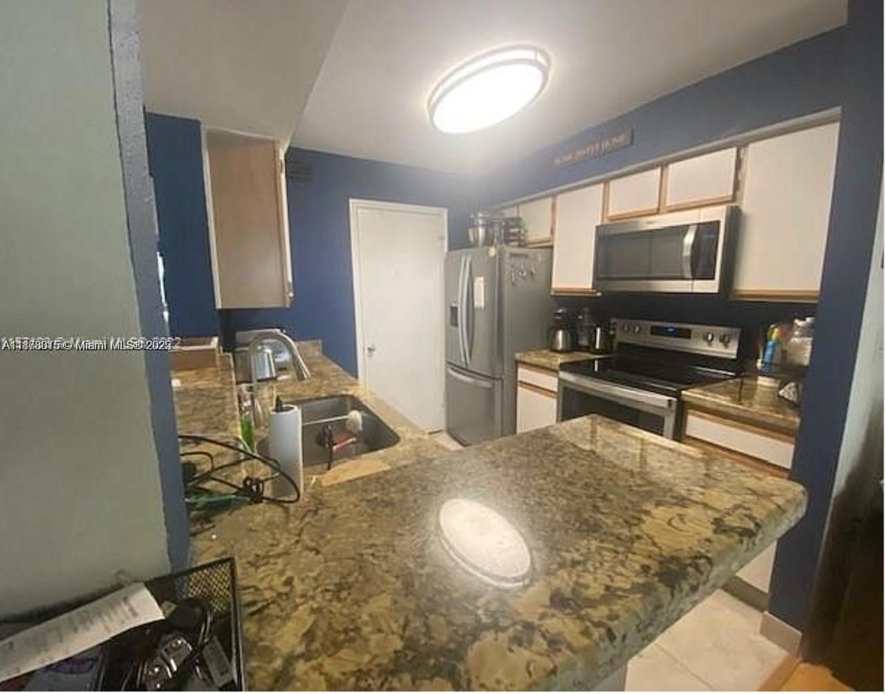 84b12bae-7373 2445 NW 33rd St # 1413, Oakland Park FL 33309 — #A11878015