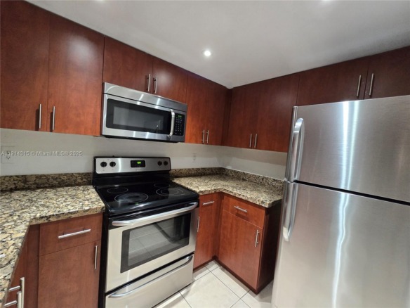 6940 Miami Gardens Dr # 319, Hialeah FL 33015 — #A11914315