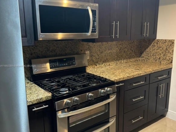 18101 NW 68th Ave # D207, Hialeah FL 33015 — #A11892284